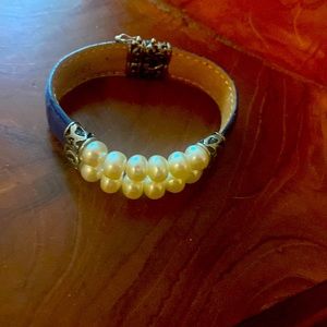 Sterling silver, leather, and pearl bracelet.